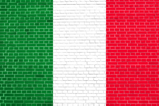 Flag of Italy on brick wall texture background