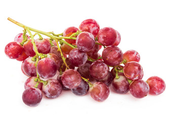 Fresh red grapes on white background, food and drink concept
