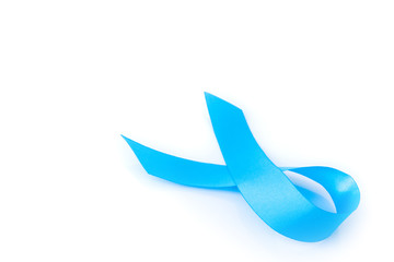 Blue ribbon on white background prostate cancer awareness concept