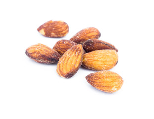 Closeup Almonds Salted on white background, selective focus