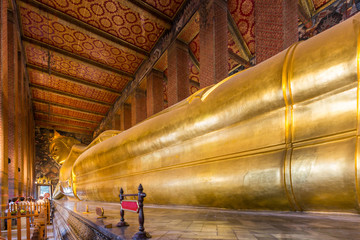 Reclining Buddha of Wat Po in Bangkok, Thailand.