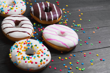 Multi-colored assortment of donuts