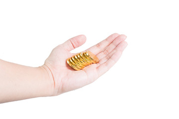 The chocolate gold coin  in hand on white background, clipping path 