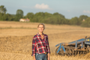 female farmer with tractor