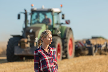 female farmer standing in wheat field © eric