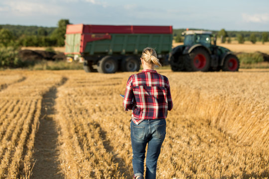 female farmer with tractor