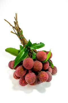 Fresh lychees on white background.