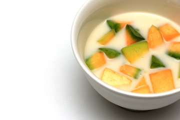 Thai dessert, Musk melon with coconut milk isolated