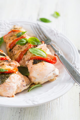 Baked chicken breast with mozzarella and cherry tomatoes with basil