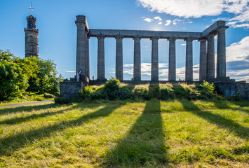 Edinburgh, Scotland - Jul 1, 2014 : People are spending their holiday around the National Monument on the Calton Hill on the sunny day, at Edinburgh city, Scotland.
