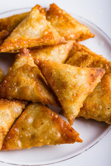 Chicken samosas deep fried.
