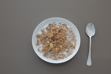 A bowl of corn flakes in milk