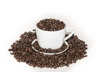 Coffee cup full of beans on a white background