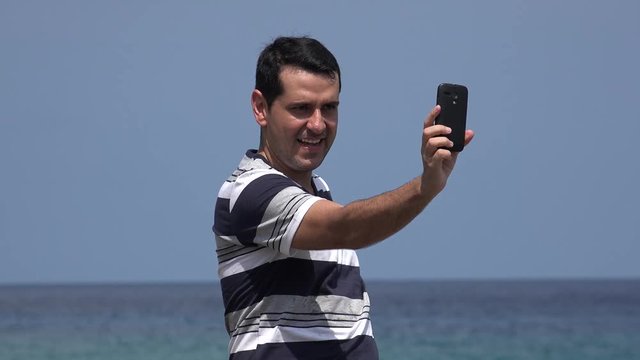 Goofy Tourist Man Taking Selfies And Having Fun