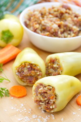 Uncooked peppers stuffed with meat, rice and vegetable