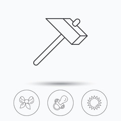 Hammer, pacifier and sun icons.