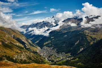 Fototapeta premium Snow capped alpine mountains. Trek near Matterhorn mount.