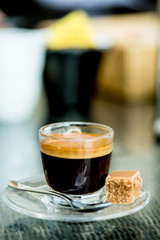 Cup of Strong Single Shot Espresso Coffee in a Glass Cup 