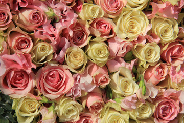 Fototapeta na wymiar White and pink roses in wedding arrangement