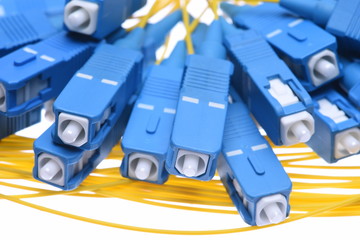 Fiber cables sc connectors closeup isolated on white background