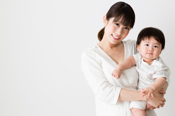 portrait of asian mother and baby