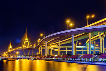 Fototapeta na wymiar Thai bridge / Night light traffic at Bhumibol bridge, Bangkok, Thailand.