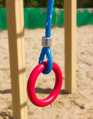 red gym ring, Playground ,under the open sky on a sand platform