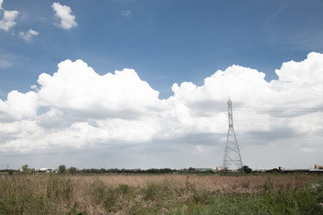 Fototapeta na wymiar Landscape shot of a electricity pole with beautiful sky.