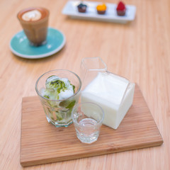 Iced green tea latte on the table