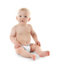 Baby sitting on white background