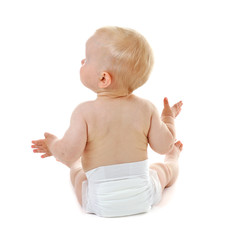 Baby sitting on white background