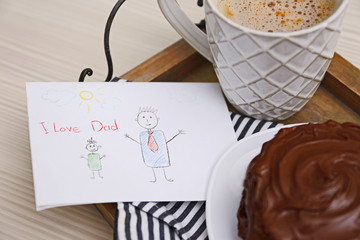 Chocolate pancakes with paint and coffee on table. Happy fathers day concept