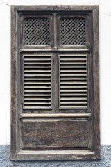 wooden shuttered window