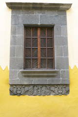wooden shuttered window
