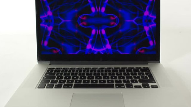 laptop computer with an abstract screensaver