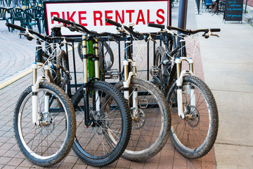 Mountain Bike Rentals in Stand on Street in Vacation Holiday Destination