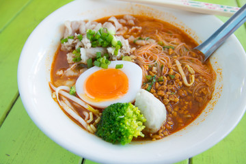 Hot and spicy noodle on the green table