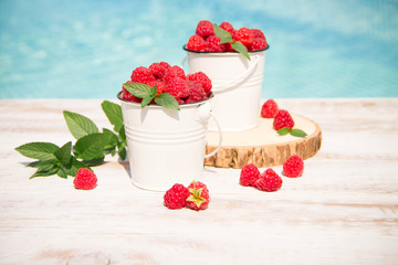 Ice cream with berries on wooden background