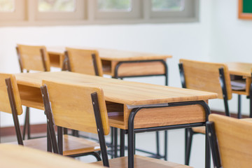 School classroom with desks wood, chalkboard and whiteboard 