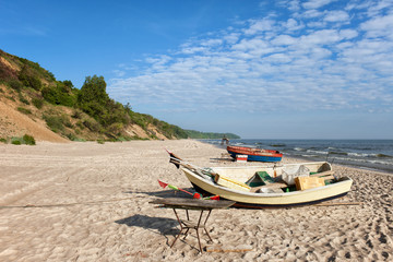 Naklejka na ściany i meble Fishing Boats on Baltic Sea Beach