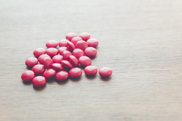 medicine pill on wood table