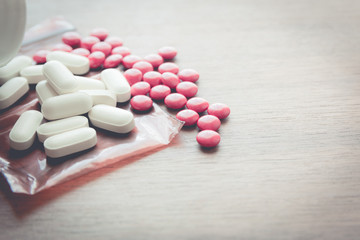 medicine pill on wood table
