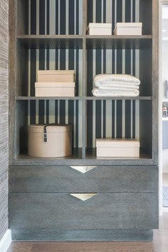 Storage shelf in walk in closet space, modern classic style