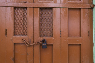 Old door with lock at the city of the ancient city of Varanasi,India