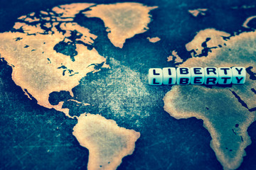 LIBERTY on grunge world map