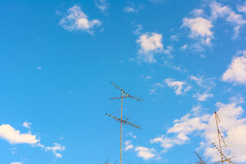 Old antenna with blue sky