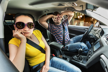 Couple driving in the car