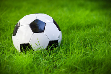 Fototapeta na wymiar Soccer ball on grass