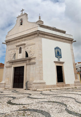 Fototapeta na wymiar Exterior of small white church in Portugal.