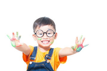 cute boy with hands painted in colorful paints ready for hand prints